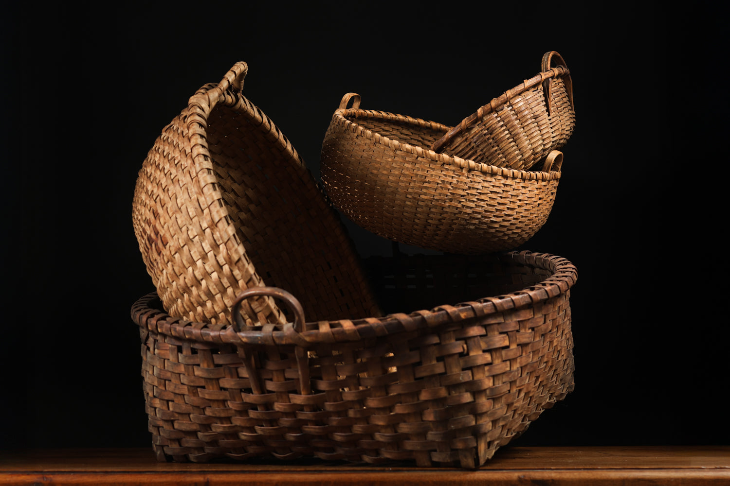 Ensemble of Four Woven Baskets, c. 20th Century